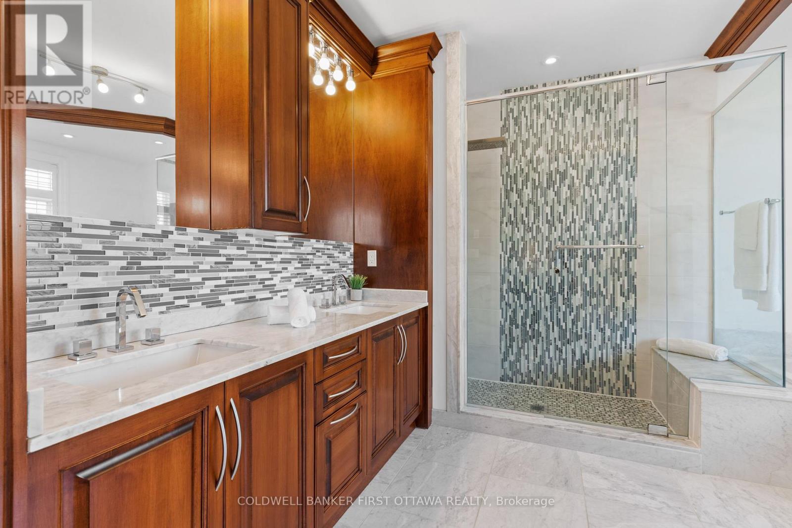 6 pc ensuite bathroom w rain shower & dual vanity. - 1623 Claymor Avenue, Ottawa, ON - Indoor Photo Showing Bathroom