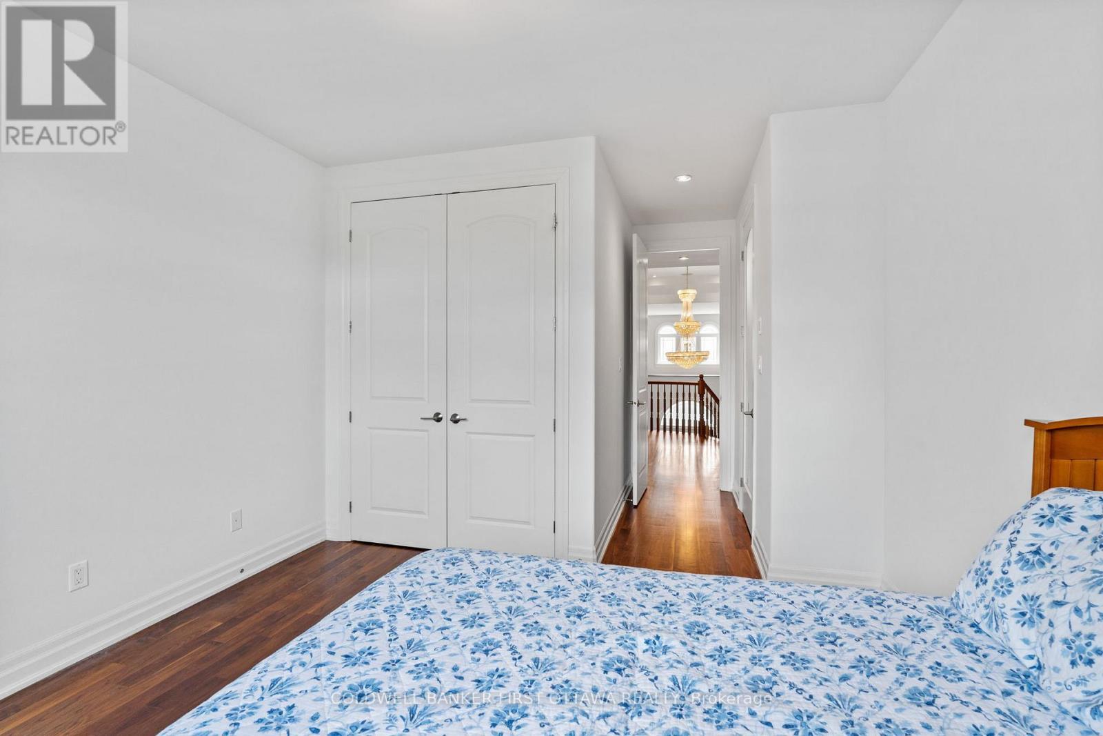 Dbl door closet & fixture above. - 1623 Claymor Avenue, Ottawa, ON - Indoor Photo Showing Bedroom