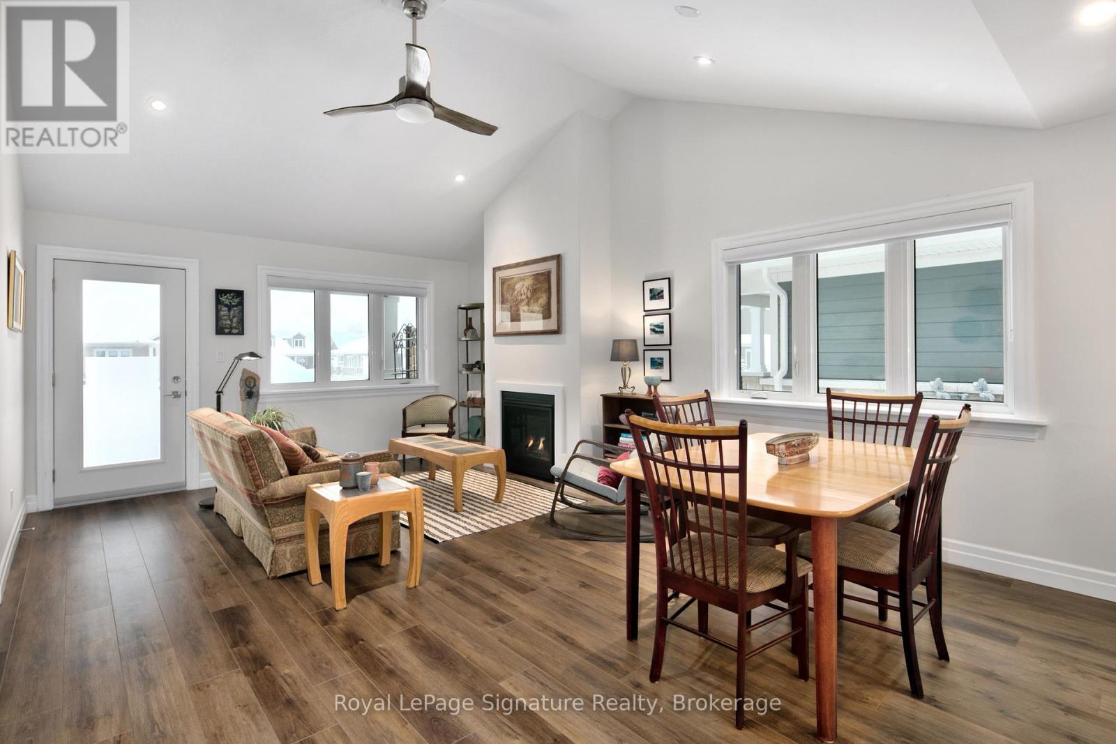 116 Dove Drive, Blue Mountains, ON - Indoor Photo Showing Dining Room With Fireplace
