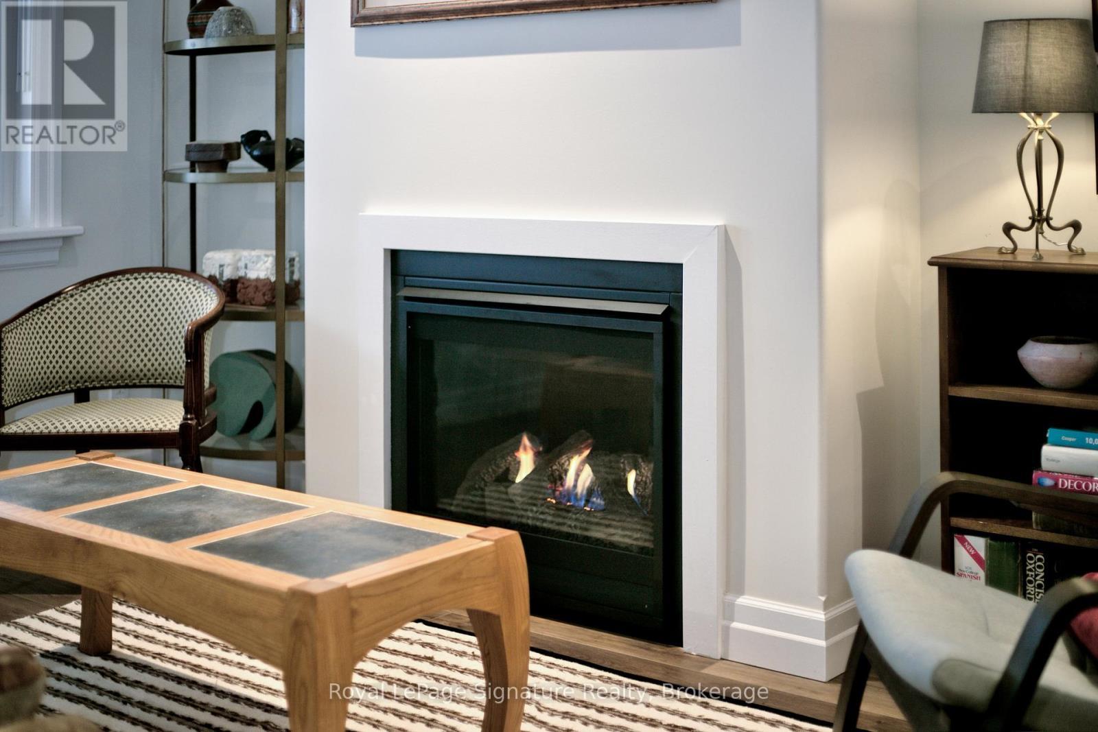 Gas fireplace - 116 Dove Drive, Blue Mountains, ON - Indoor Photo Showing Living Room With Fireplace