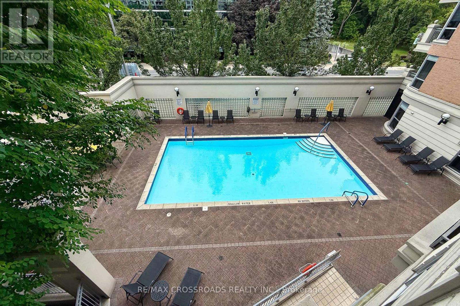 210 - 10 Old York Mills Road, Toronto, ON - Outdoor With In Ground Pool