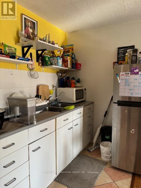 14 - 23 Four Winds Drive, Toronto, ON - Indoor Photo Showing Kitchen