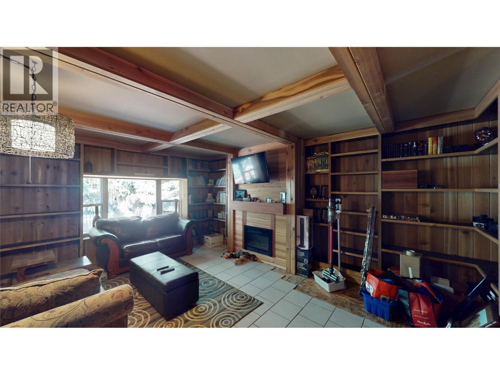 6228 Tamarack Road, Wasa, BC - Indoor With Fireplace