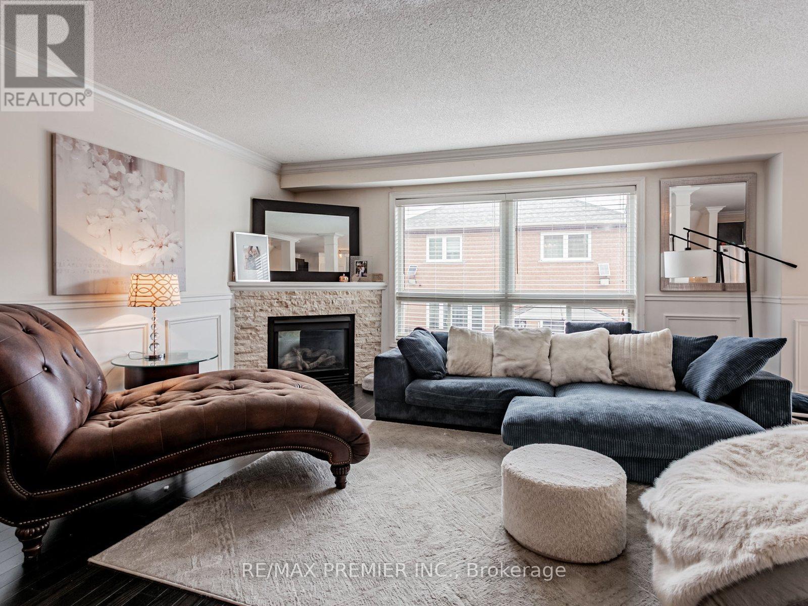 11 Four Seasons Circle, Brampton, ON - Indoor Photo Showing Living Room With Fireplace