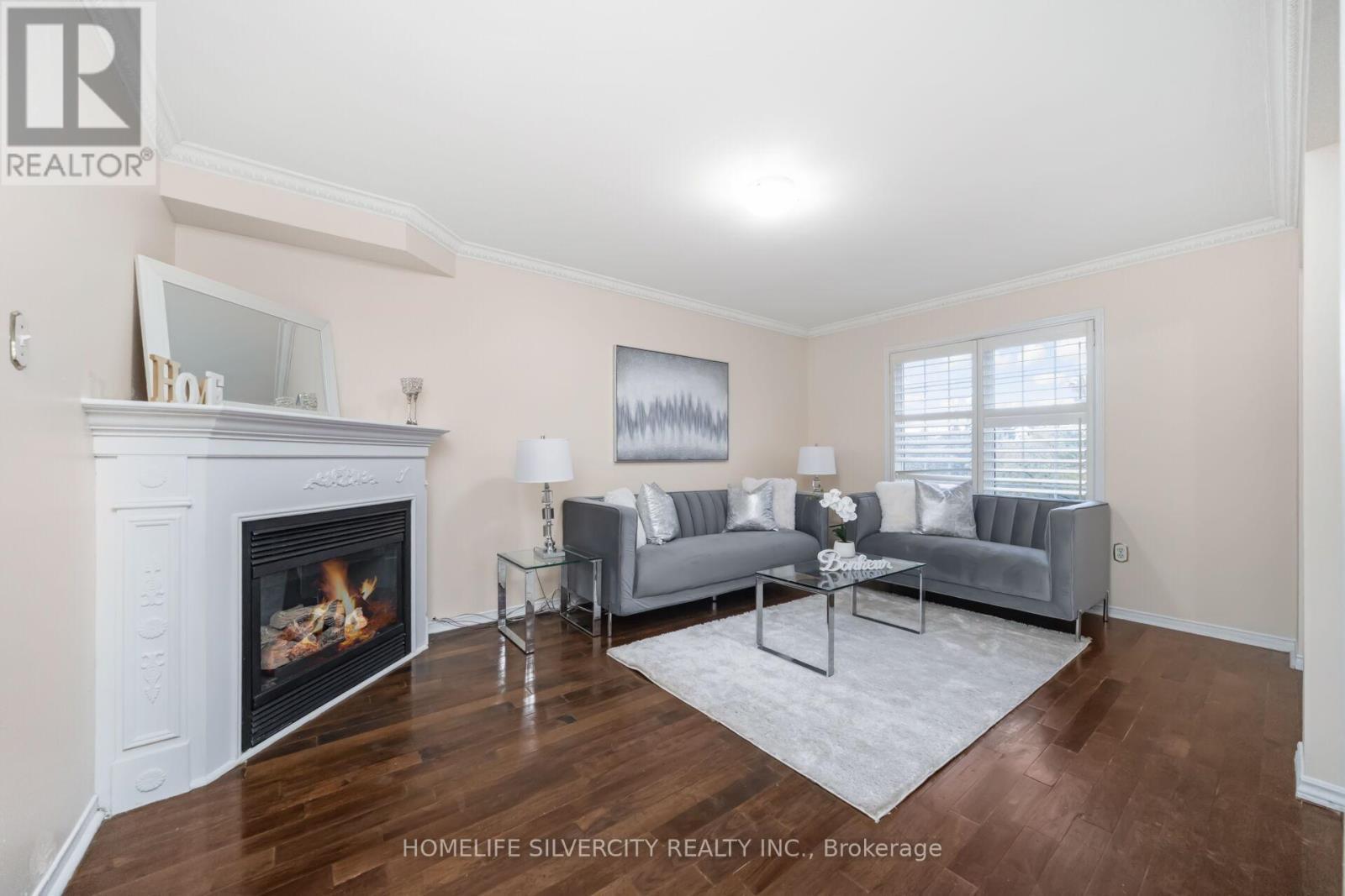 16 Coralreef Crescent, Brampton, ON - Indoor Photo Showing Living Room With Fireplace