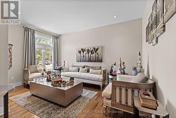 Main floor office / den with Glass French Doors -