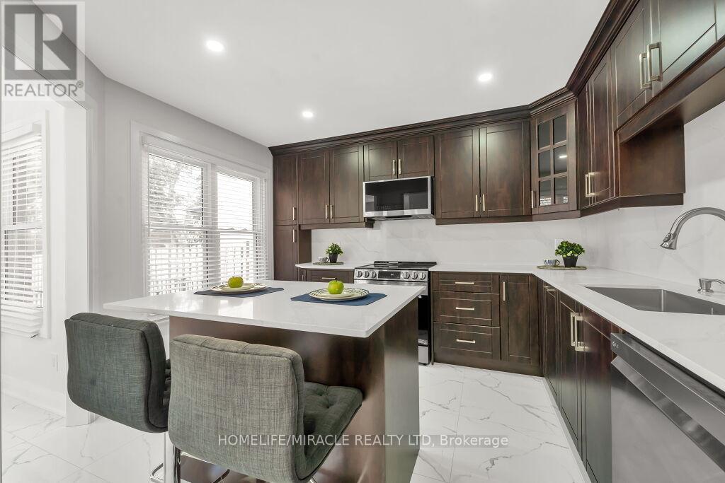 Upper - 57 Lord Simcoe Drive, Brampton, ON - Indoor Photo Showing Kitchen With Upgraded Kitchen
