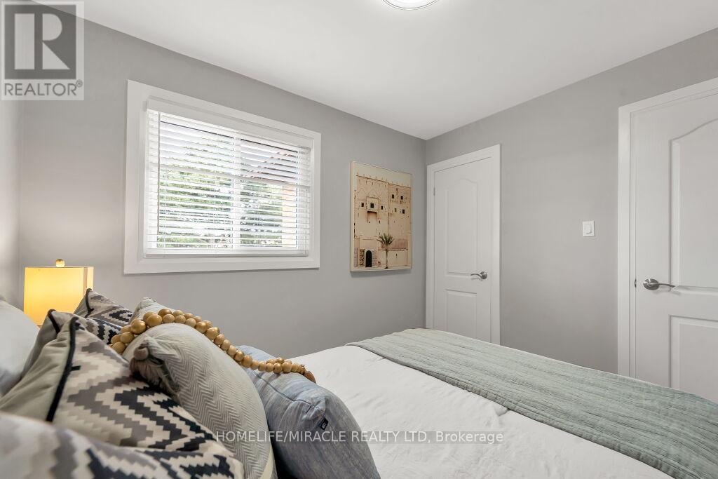 Upper - 57 Lord Simcoe Drive, Brampton, ON - Indoor Photo Showing Bedroom