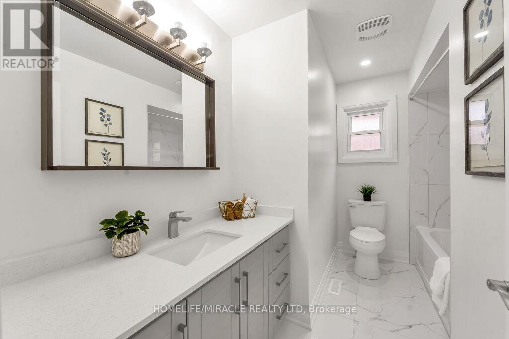 Upper - 57 Lord Simcoe Drive, Brampton, ON - Indoor Photo Showing Bathroom