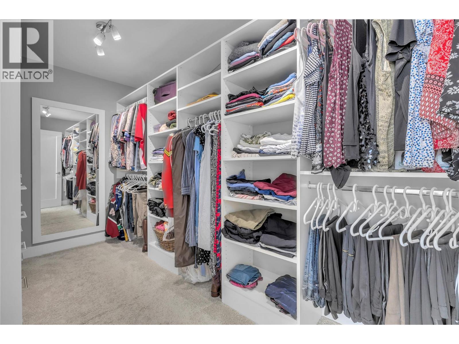 generous walk-in with custom built ins - 1823 Diamond View Drive, West Kelowna, BC - Indoor With Storage