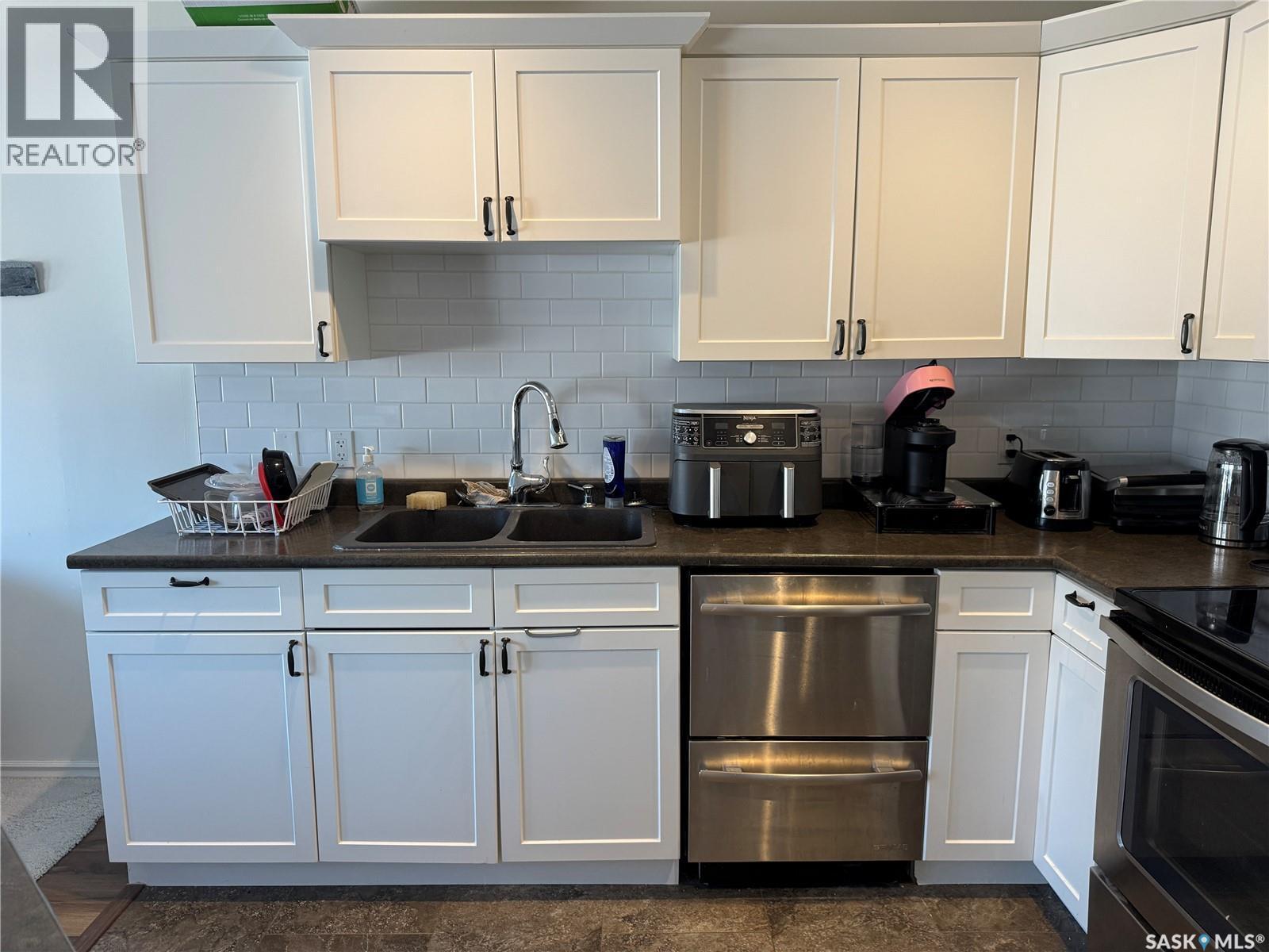2 356 Studer Street, La Ronge, SK - Indoor Photo Showing Kitchen With Double Sink