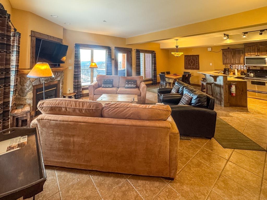 G4-A-1351 Gerry Sorensen Way, Kimberley, BC - Indoor Photo Showing Living Room With Fireplace