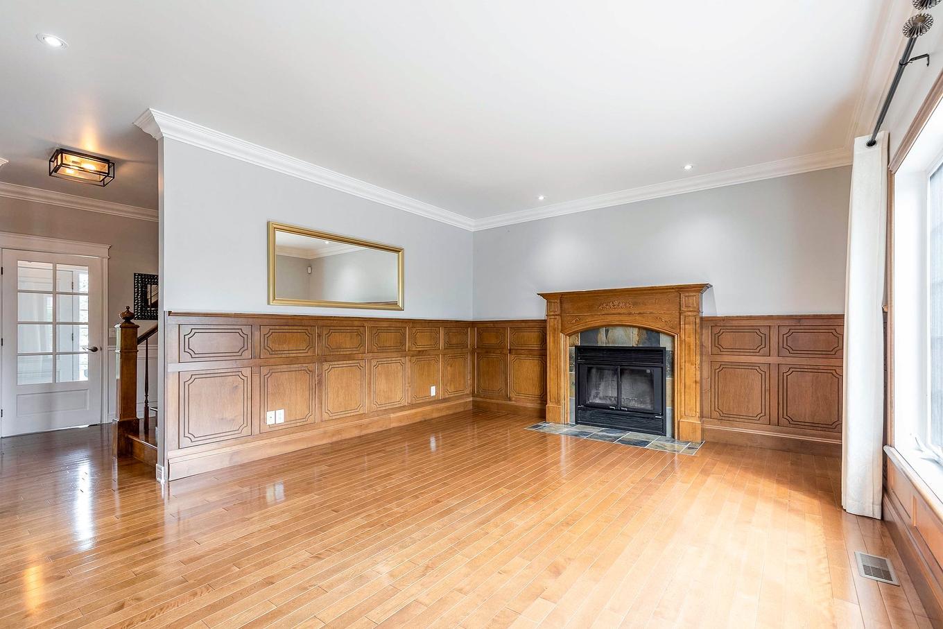 Salon - 8 Rue De Josselin, Blainville, QC - Indoor With Fireplace