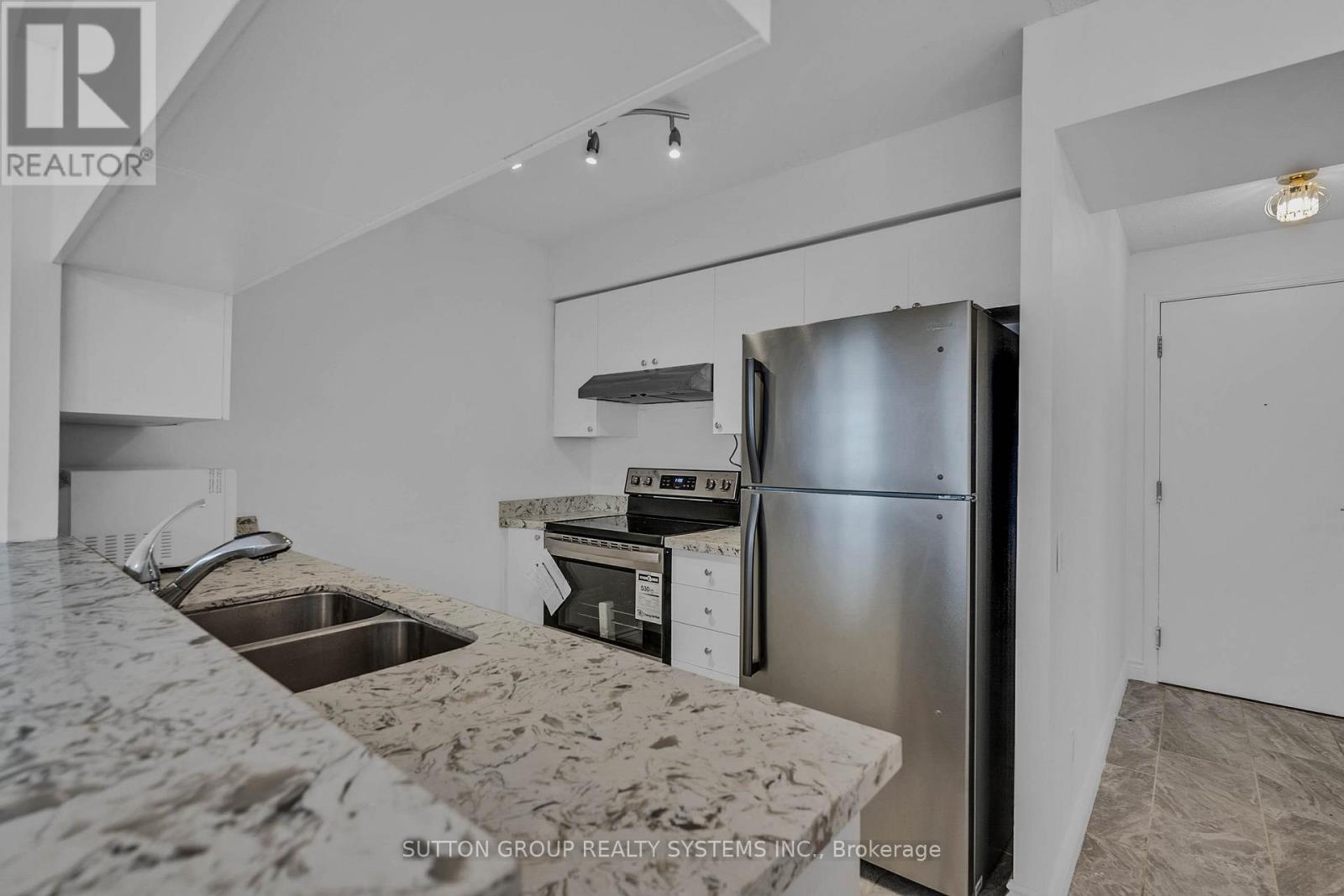 317 - 1200 The Esplanade North Road, Pickering, ON - Indoor Photo Showing Kitchen With Double Sink
