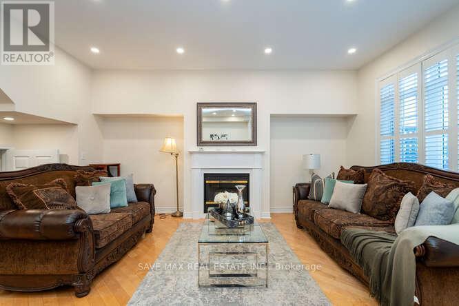 3452 Eglinton Avenue W, Mississauga, ON - Indoor Photo Showing Living Room With Fireplace