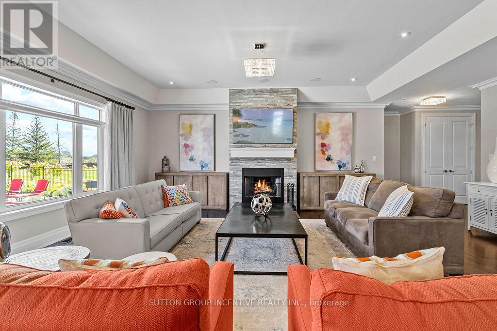 327 Sunnybrae Avenue, Innisfil, ON - Indoor Photo Showing Living Room With Fireplace