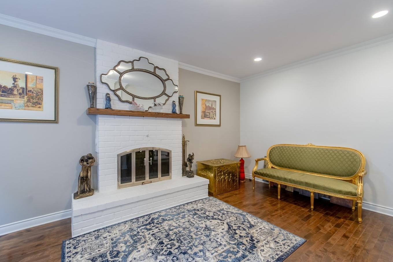 Family room - 990 Rue Renoir, Brossard, QC - Indoor Photo Showing Other Room With Fireplace