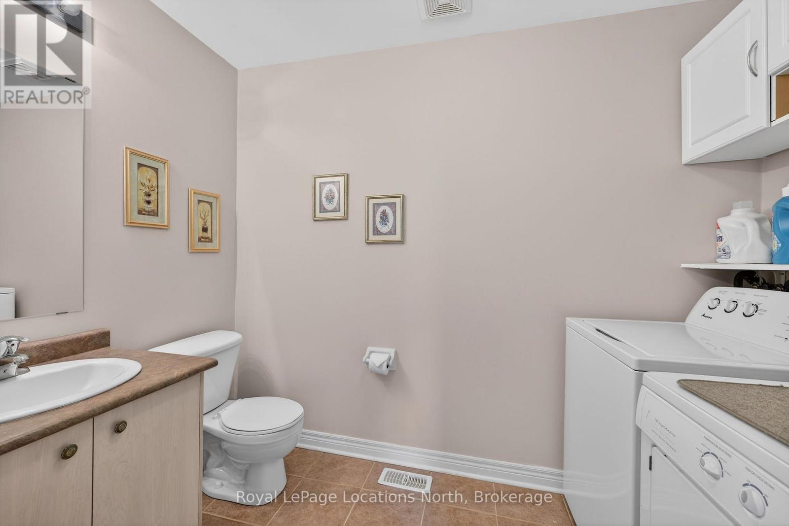 Main floor 2 pc + laundry - 15 Princess Point Drive, Wasaga Beach, ON - Indoor Photo Showing Bathroom