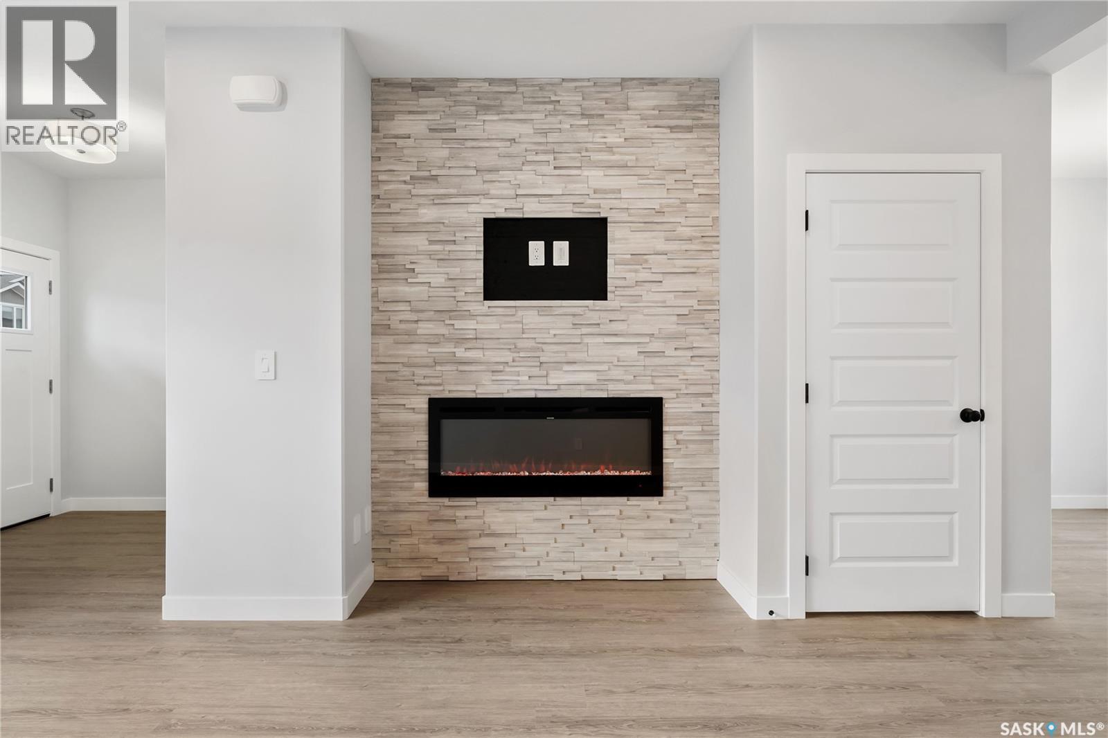 3160 Green Turtle Road, Regina, SK - Indoor With Fireplace