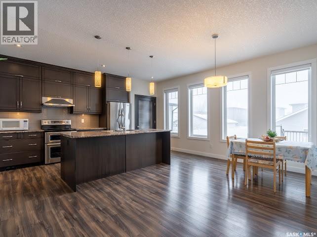 4337 Green Apple Drive E, Regina, SK - Indoor Photo Showing Kitchen With Stainless Steel Kitchen With Upgraded Kitchen