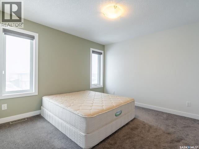 4337 Green Apple Drive E, Regina, SK - Indoor Photo Showing Bedroom