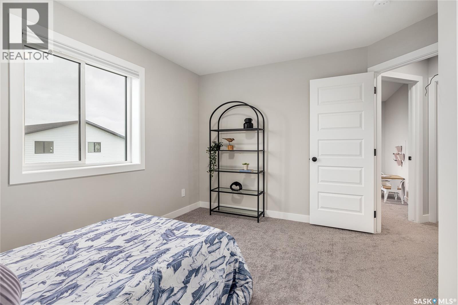 323 Asokan Bend, Saskatoon, SK - Indoor Photo Showing Bedroom