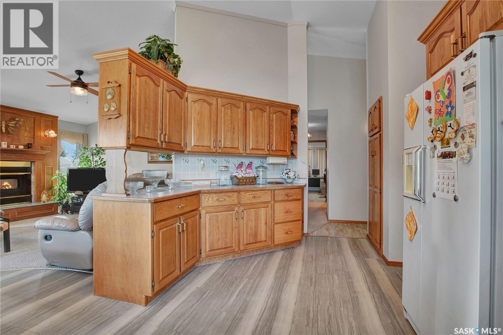 302 6Th Street, Hague, SK - Indoor Photo Showing Kitchen With Fireplace