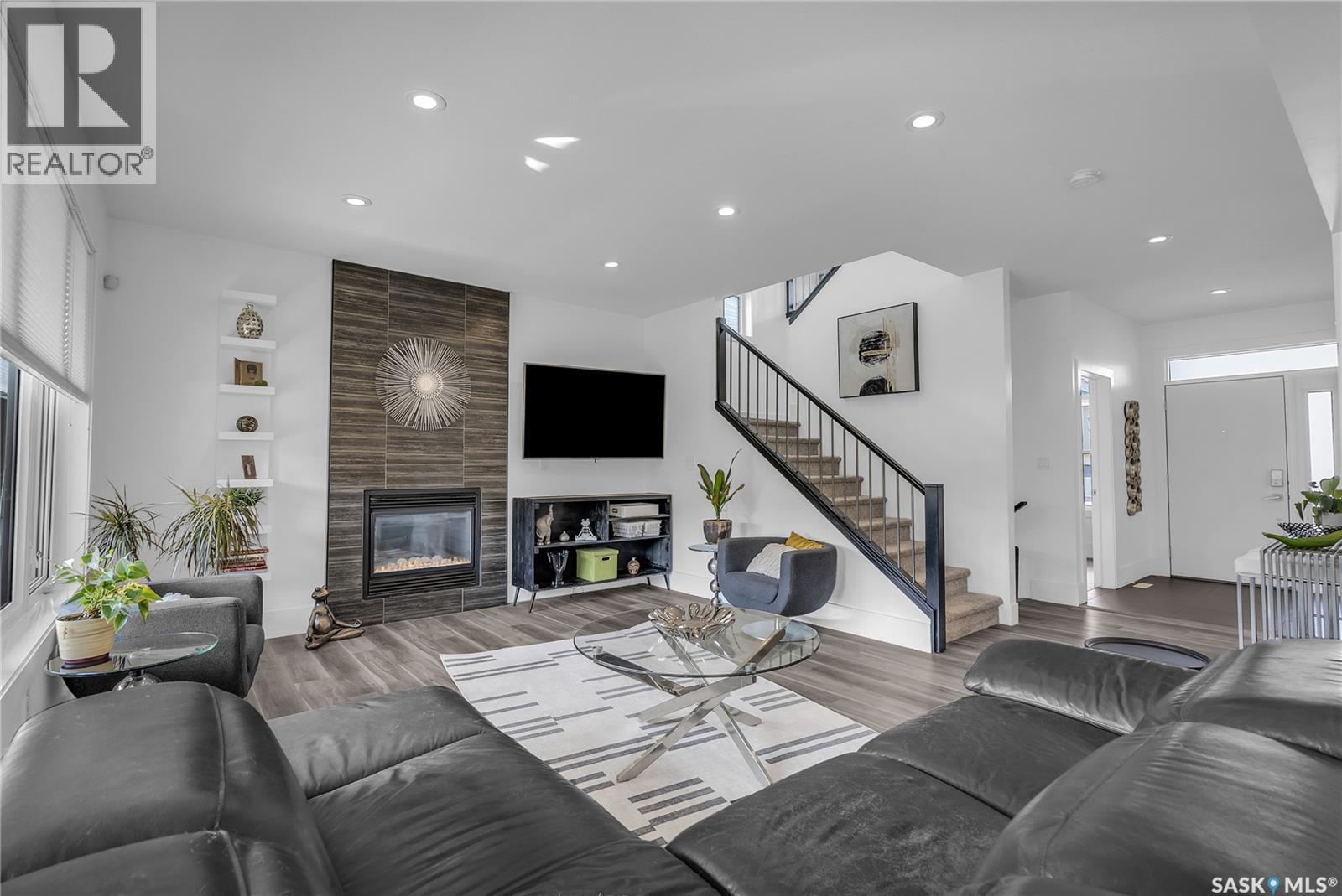 231 Atton Court, Saskatoon, SK - Indoor Photo Showing Living Room With Fireplace