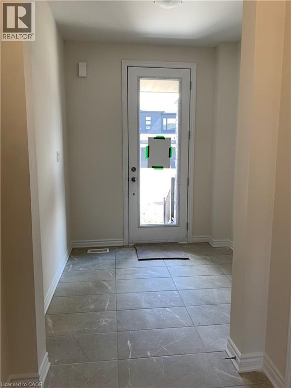 Entryway with baseboards - 49 Eberhardt Drive, Wasaga Beach, ON - Indoor Photo Showing Other Room