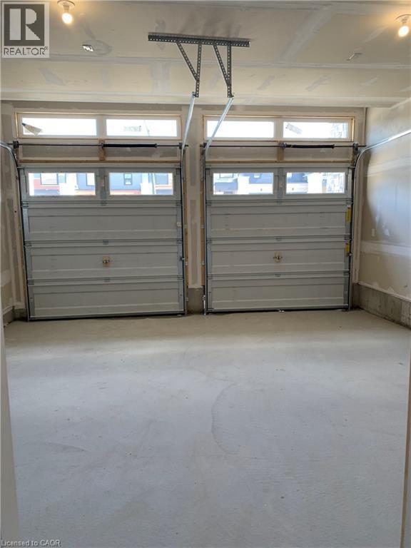 View of garage - 49 Eberhardt Drive, Wasaga Beach, ON - Indoor Photo Showing Garage