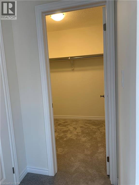 Spacious closet featuring light colored carpet - 49 Eberhardt Drive, Wasaga Beach, ON - Indoor