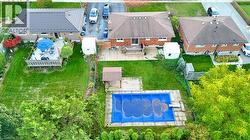 View of subject property with a pool -