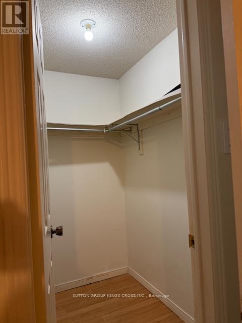 Primary Bedroom Closet - 157 Ecclestone Drive, Brampton, ON - Indoor With Storage