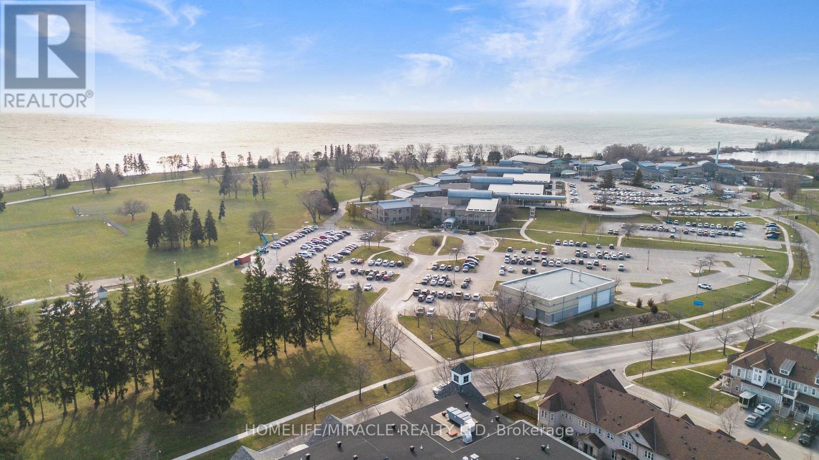 303 - 650 Gordon Street, Whitby, ON - Outdoor With Body Of Water With View