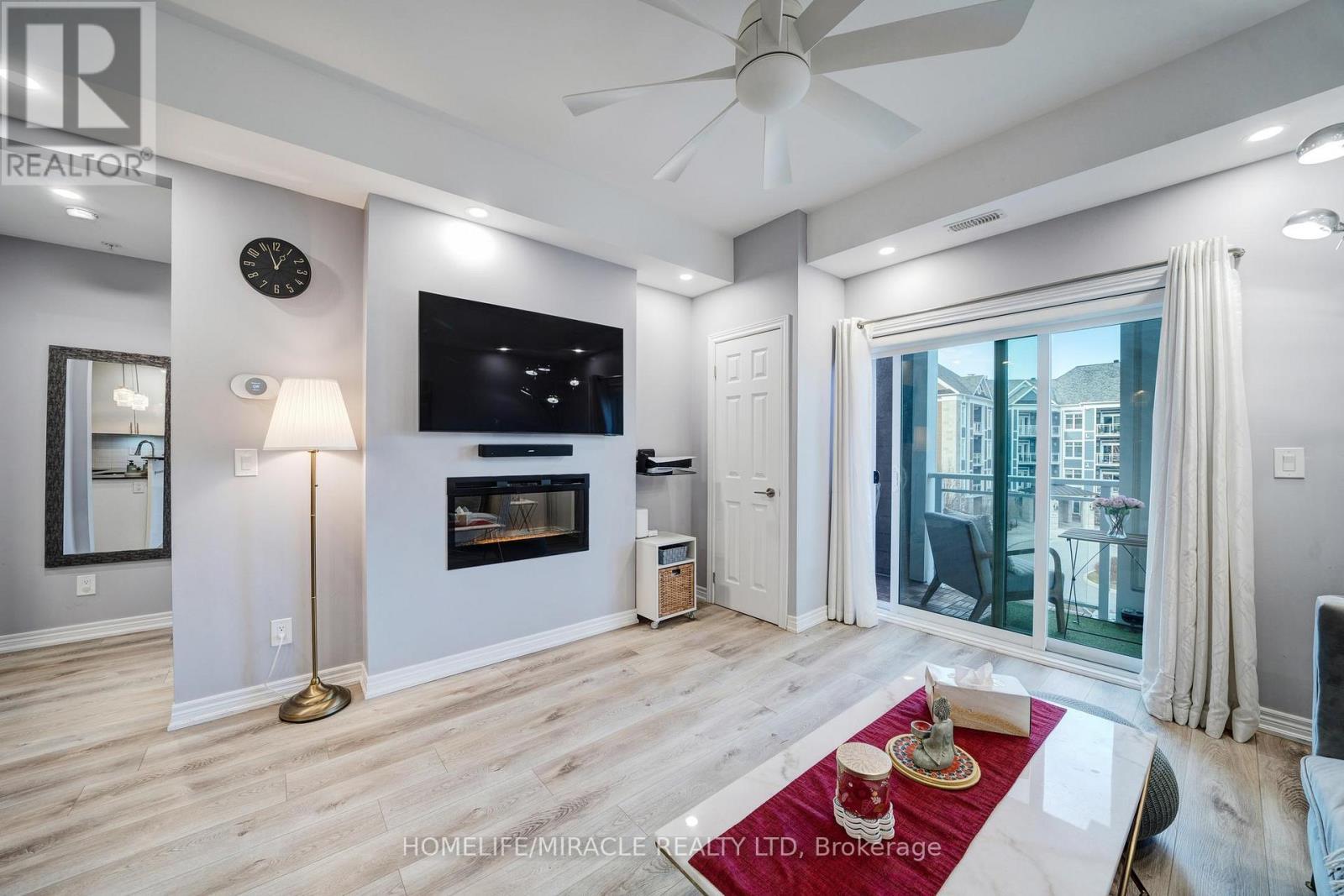 303 - 650 Gordon Street, Whitby, ON - Indoor With Fireplace