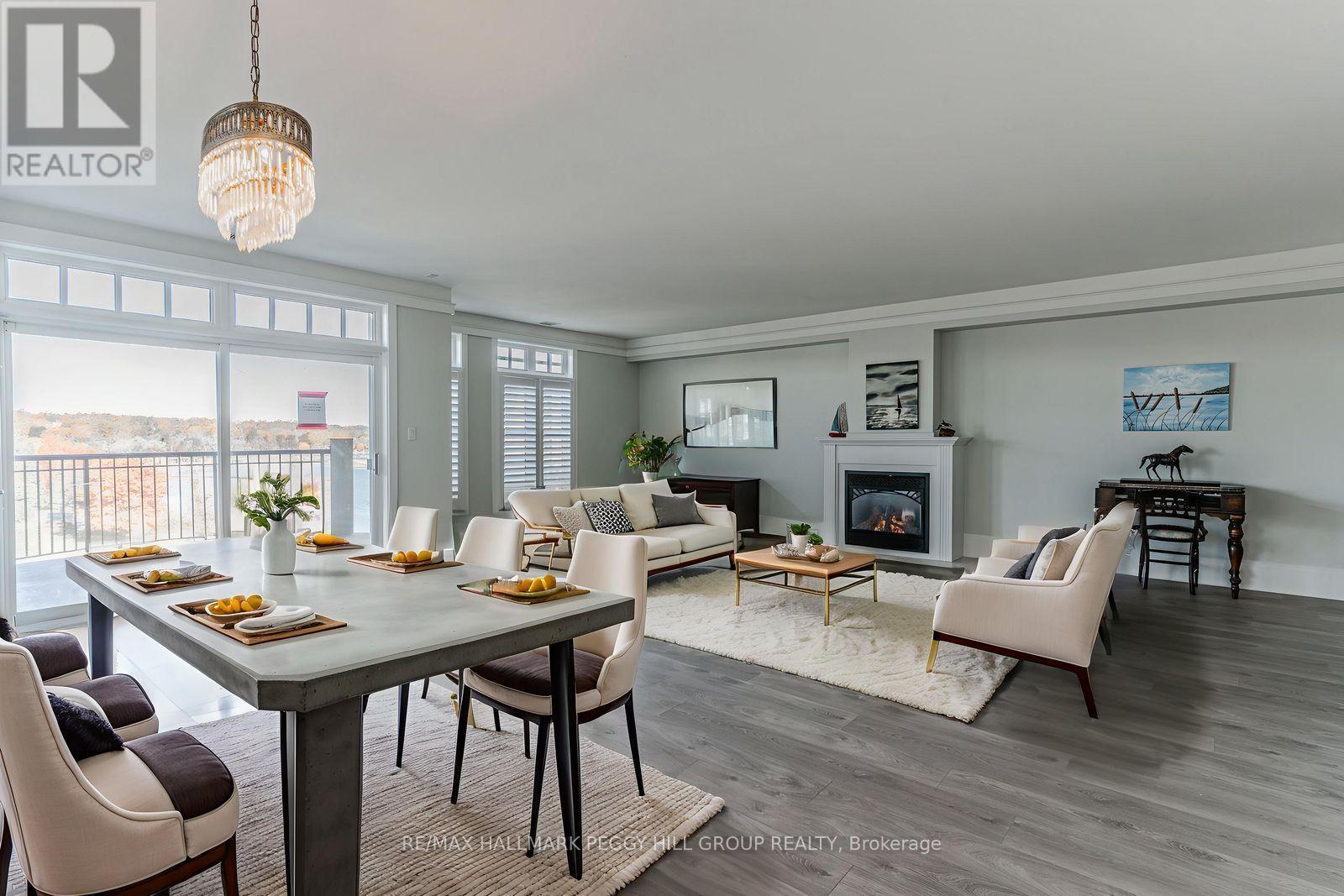 401 - 140 Cedar Island Road, Orillia, ON - Indoor Photo Showing Living Room With Fireplace