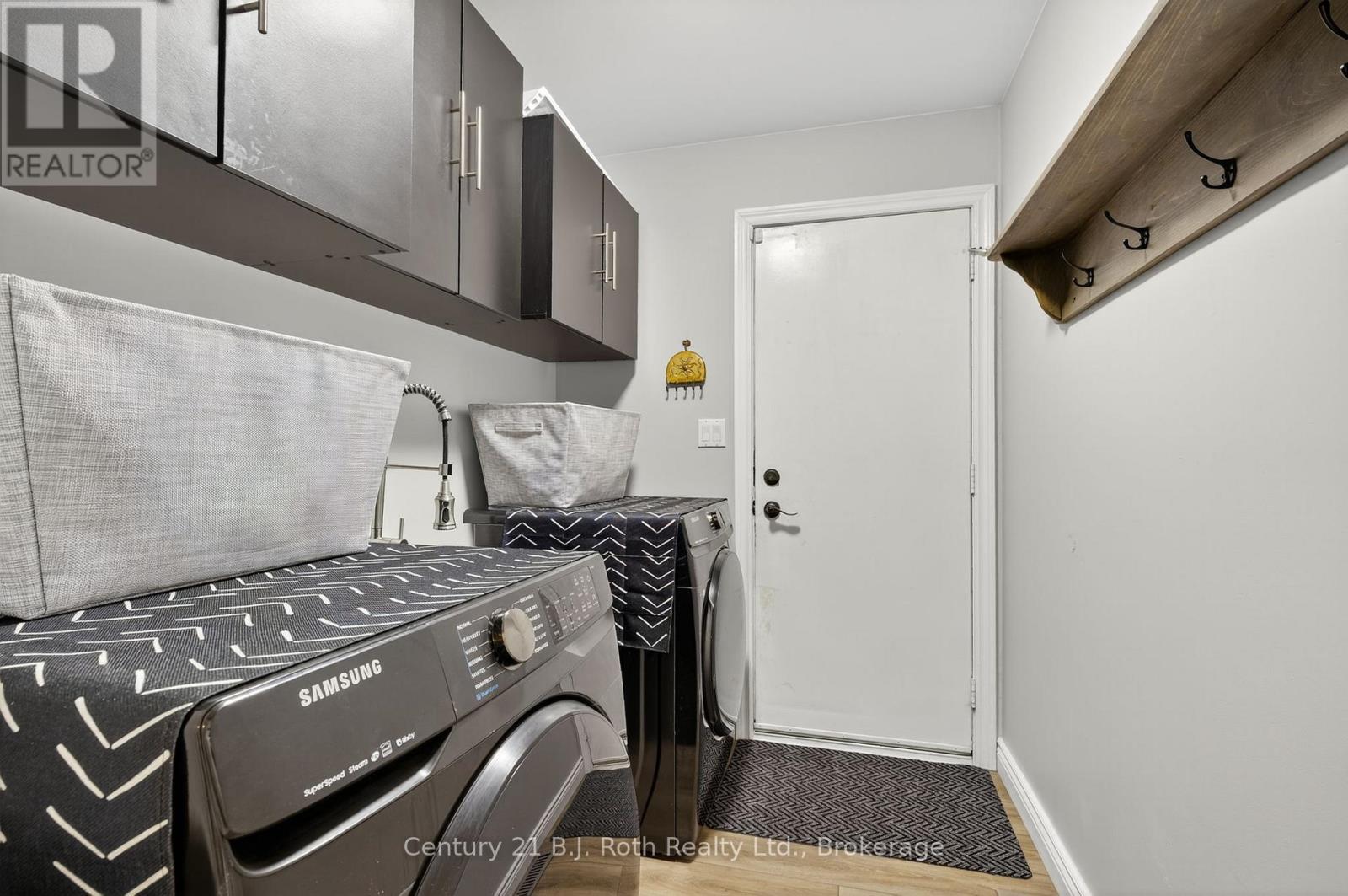 Laundry Main Floor - 83 Wozniak Road, Penetanguishene, ON - Indoor Photo Showing Laundry Room