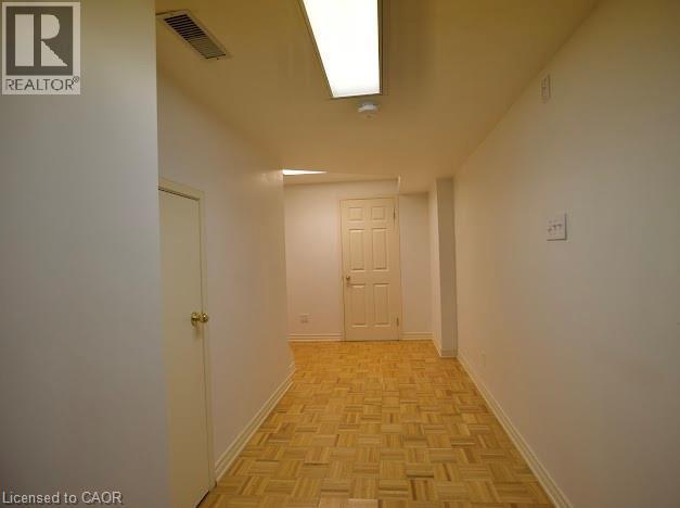 Corridor with baseboards - 109 Beechmanor Crescent, Kitchener, ON - Indoor Photo Showing Other Room