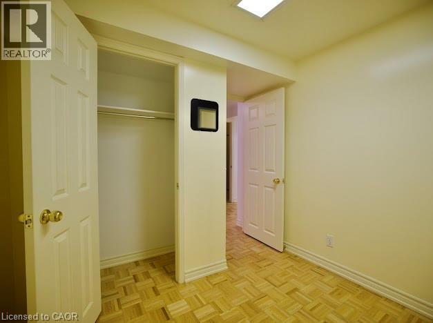 Unfurnished bedroom with baseboards and a closet - 109 Beechmanor Crescent, Kitchener, ON - Indoor Photo Showing Other Room