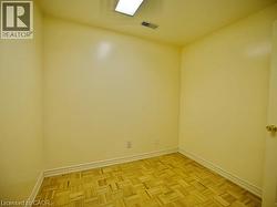 Empty room featuring baseboards -