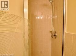 Bathroom view of a stall shower -