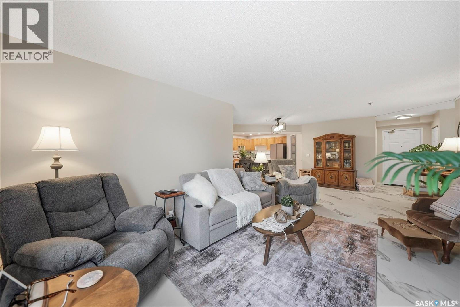 209 301 Cree Crescent, Saskatoon, SK - Indoor Photo Showing Living Room