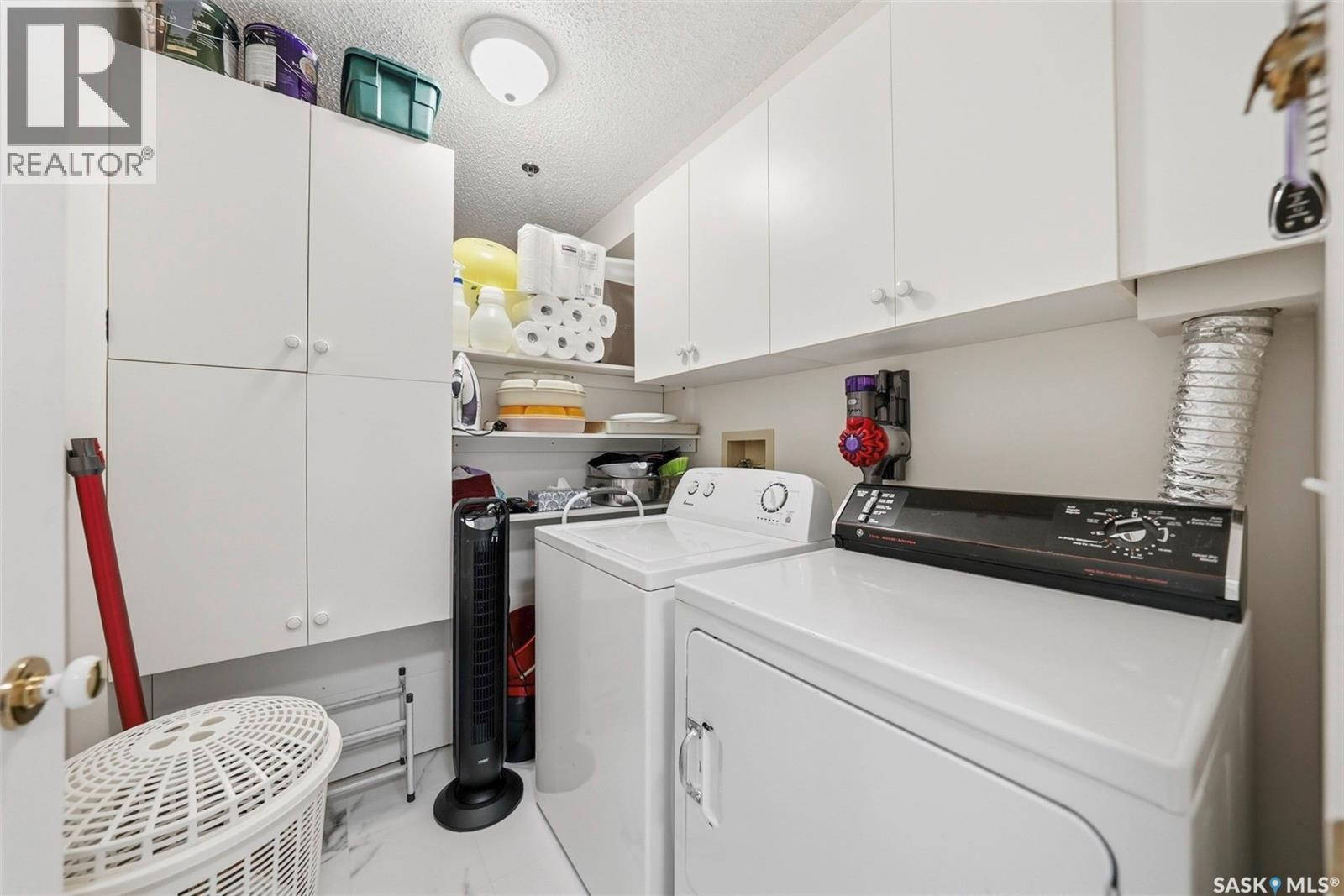 209 301 Cree Crescent, Saskatoon, SK - Indoor Photo Showing Laundry Room