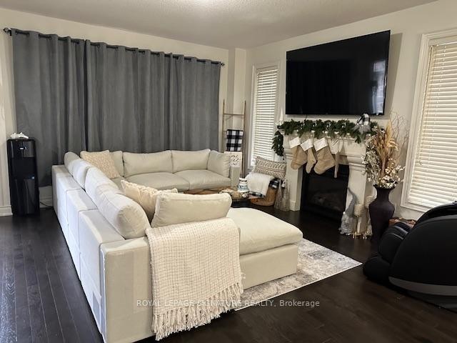 1317 Raspberry Terrace, Milton, ON - Indoor Photo Showing Living Room With Fireplace