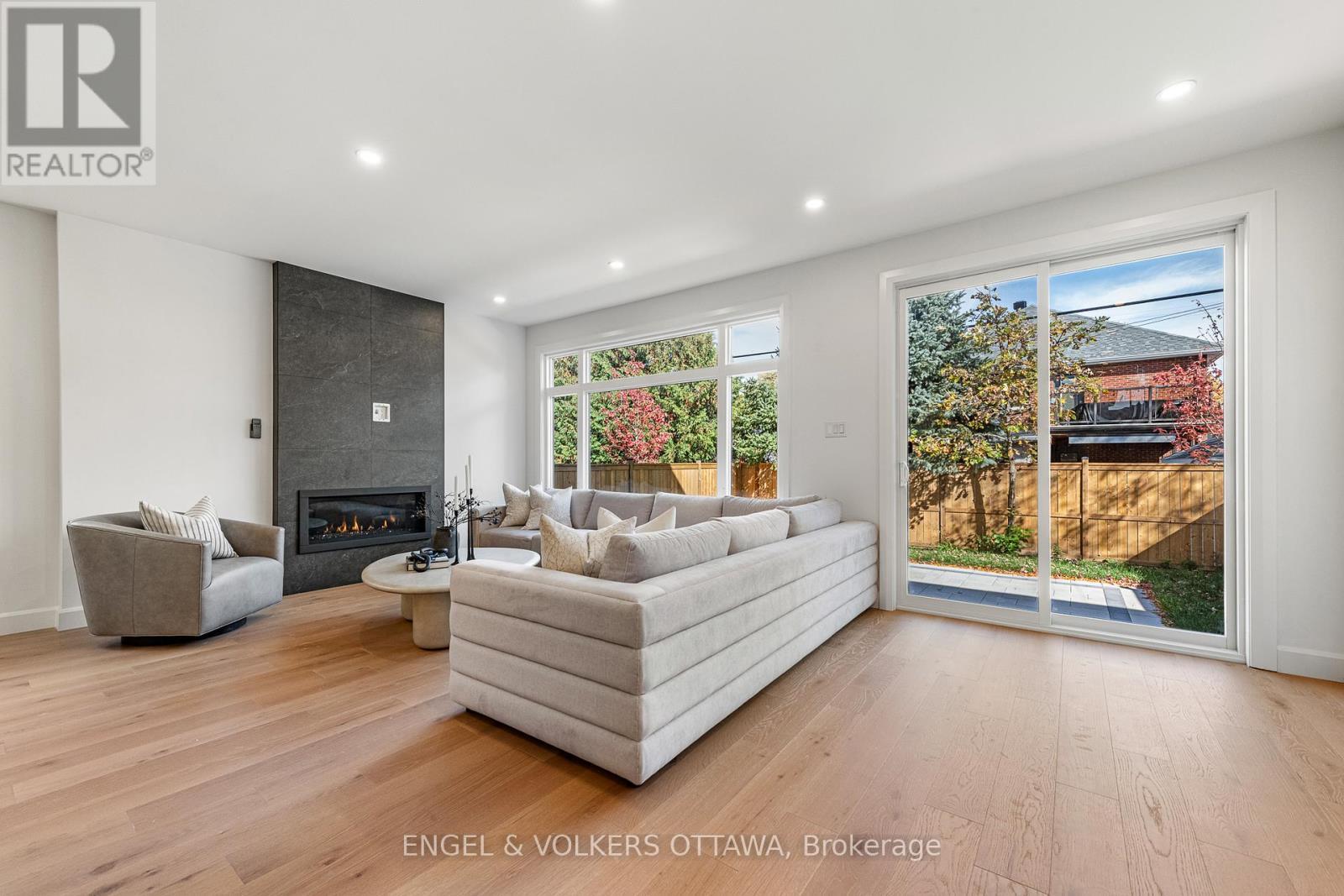 493 Highcroft Avenue, Ottawa, ON - Indoor Photo Showing Living Room With Fireplace