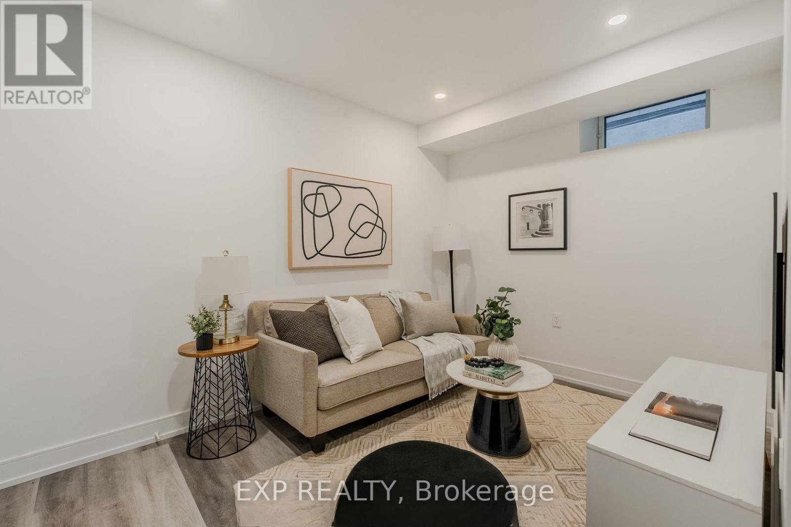 19 Devon Rd - Den Staged - Lower - 19 Devon Road, Toronto, ON - Indoor Photo Showing Living Room