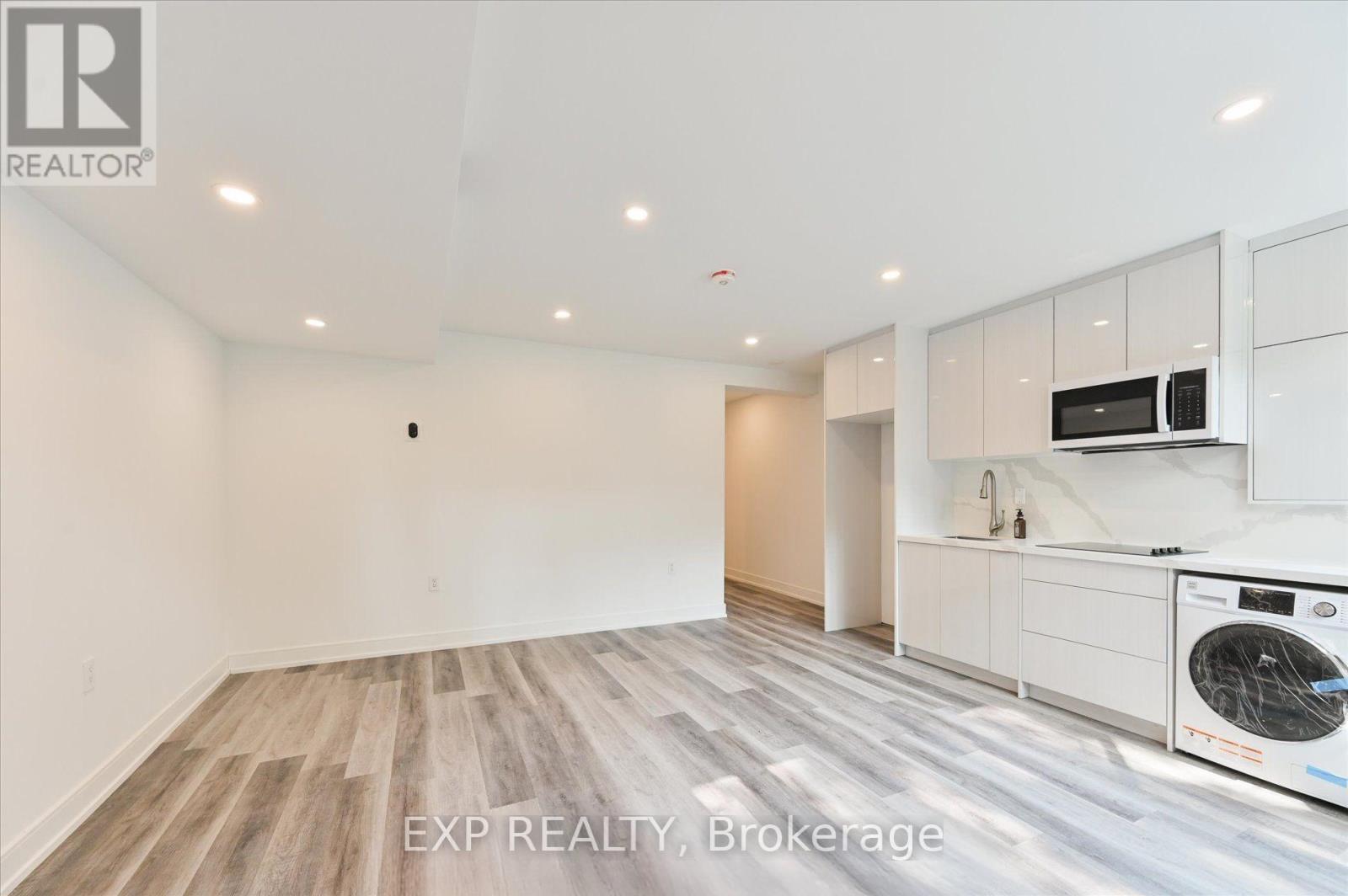 Lower - 19 Devon Road, Toronto, ON - Indoor Photo Showing Laundry Room