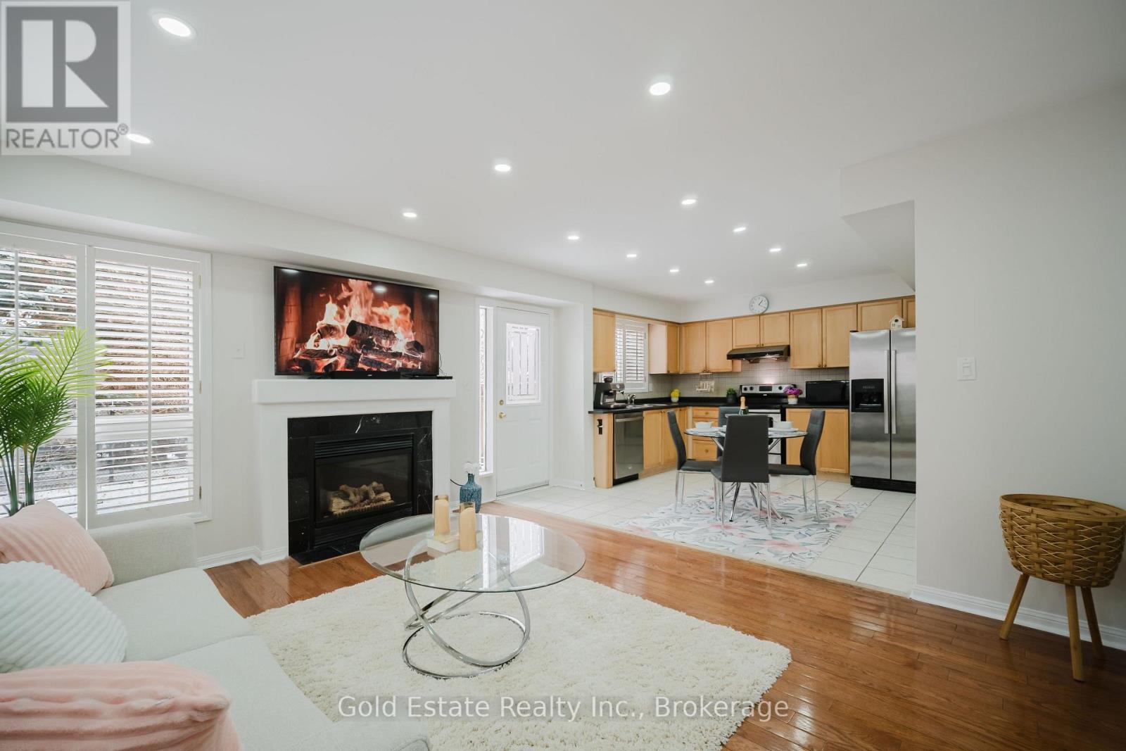 1627 Samuelson Circle, Mississauga, ON - Indoor Photo Showing Living Room With Fireplace
