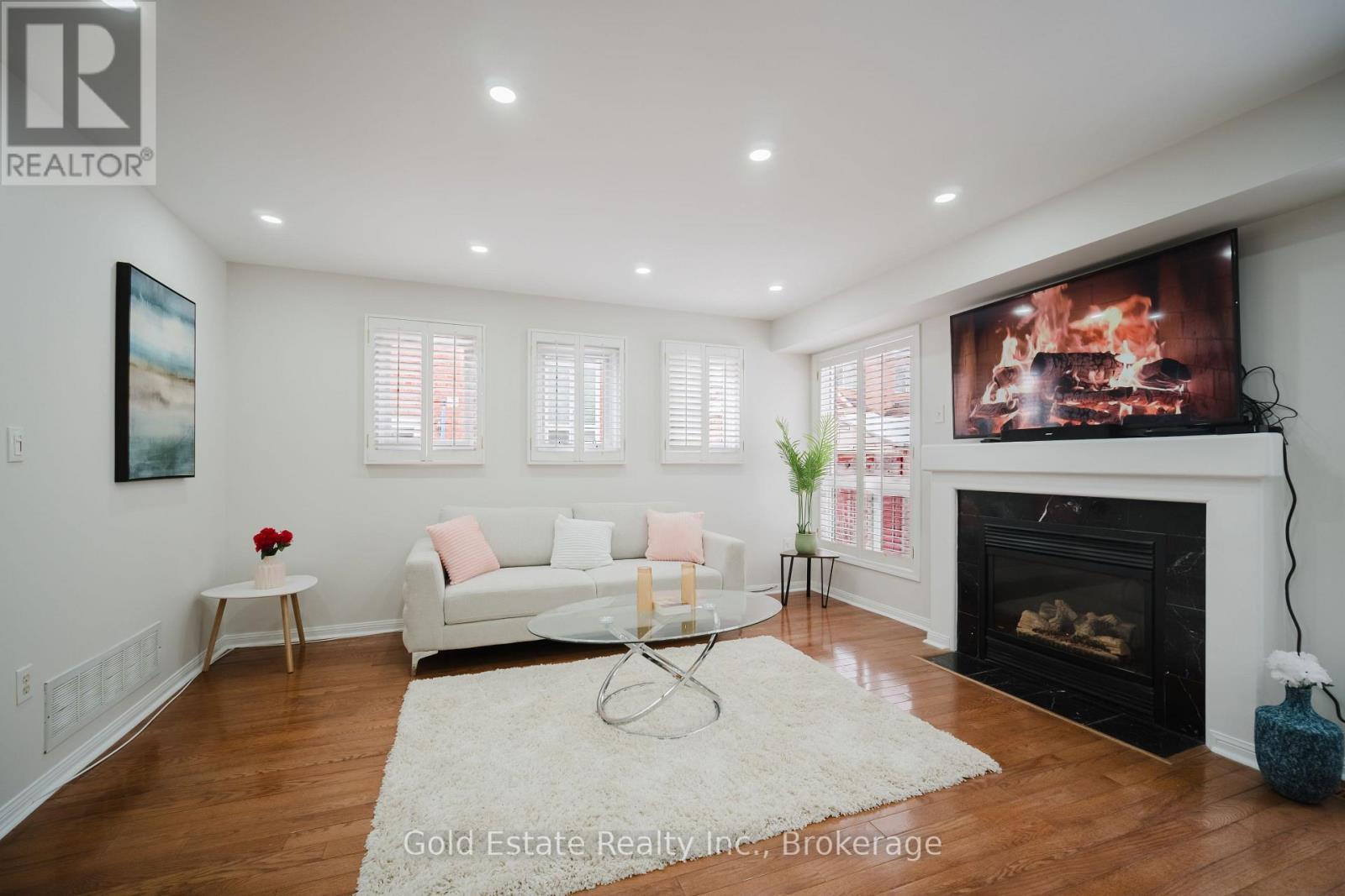 1627 Samuelson Circle, Mississauga, ON - Indoor Photo Showing Living Room With Fireplace