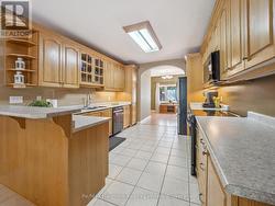 Large Kitchen, Natural Light Front to Back of Home -